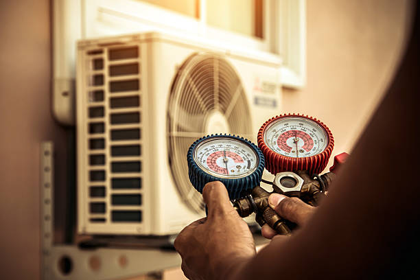 Professional Air Conditioning Service technician working in Darien, IL